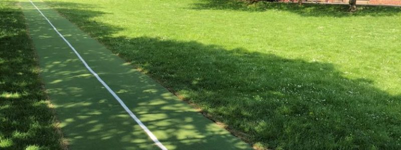 Artificial Grass | Church Lench Artificial grass Running Track Installation Artificial grass used on a straight running track
