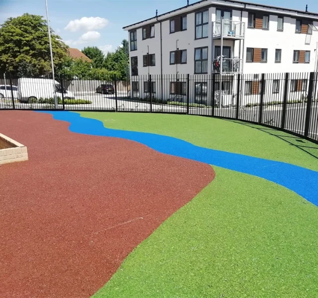EPDM Mulch Multi-Colour River Design EPDM Mulch River Design with blue, red, and green colours